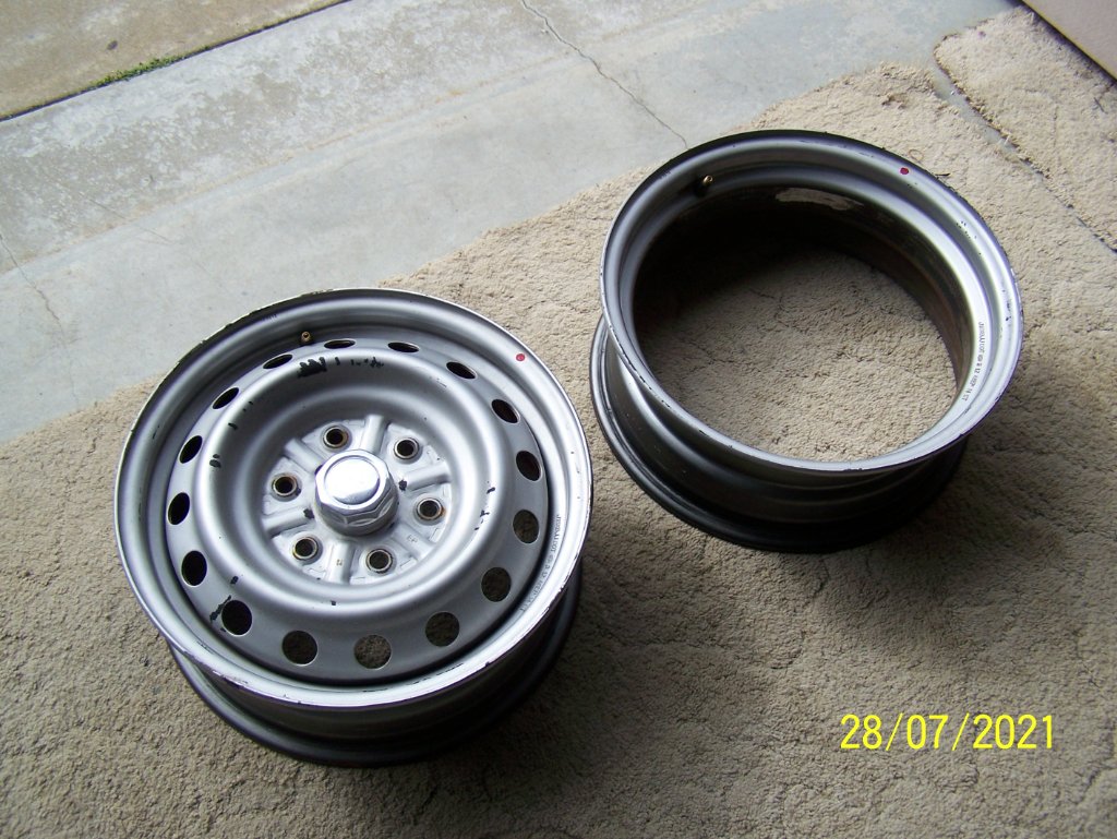 The before and after cutting the centre out of a 16x6&quot; car rim.
