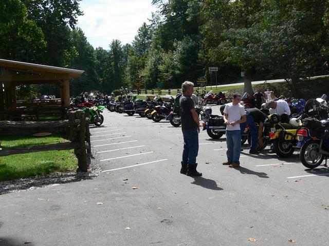 Guy checking out our bikes, Cody, Roady & Sagebrush @ Deals Gap Motor Resort. 
