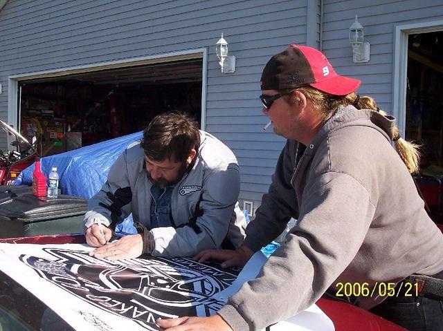 Everyone Signing The Banner