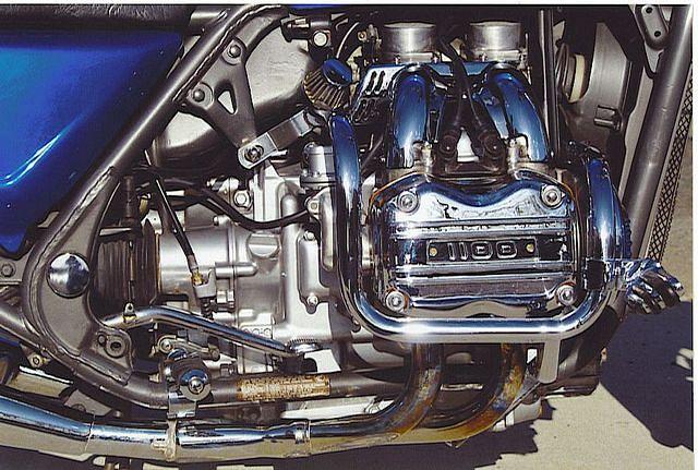 Engine detail.  Chrome DOES get you home.  Notice engine breather.  Disconnected from air box for constant clean air.  Gotta hav