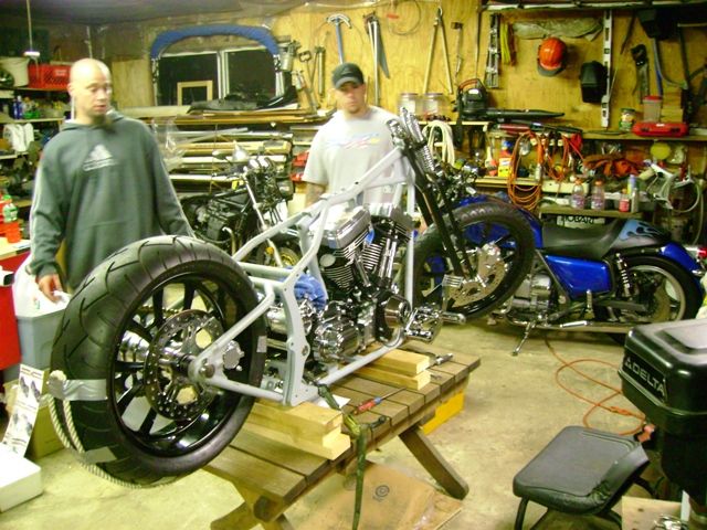 Aliberti and Big Mac getting ready to mount the forward controls.