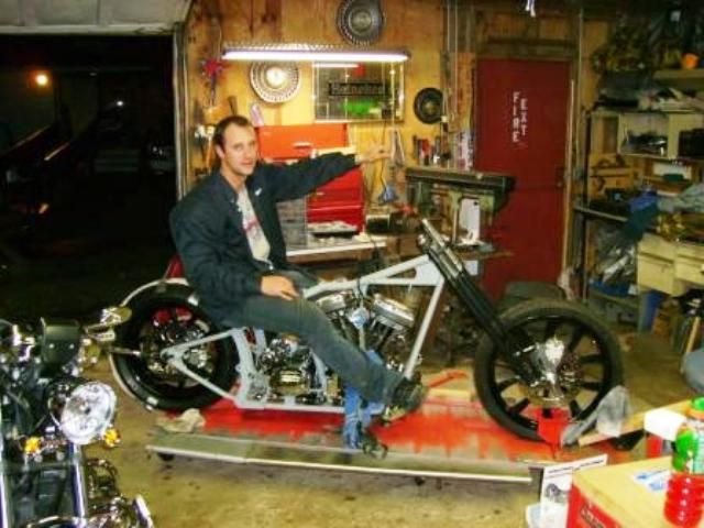 Big Pinch checking the bar height; bike finally on its lift.