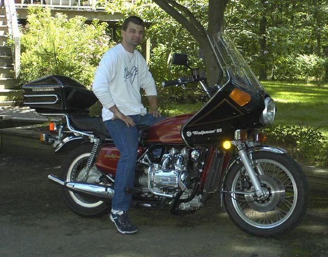 Waiting for the picture to be taken so I can get down to work. See that bent exhaust tip? That bent when the seller and his budd