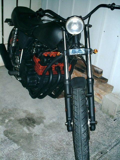I used Chevy engine orange inside the cooling fins the rest is flat black.  I put on a Rebel headlight and added shorter shocks.