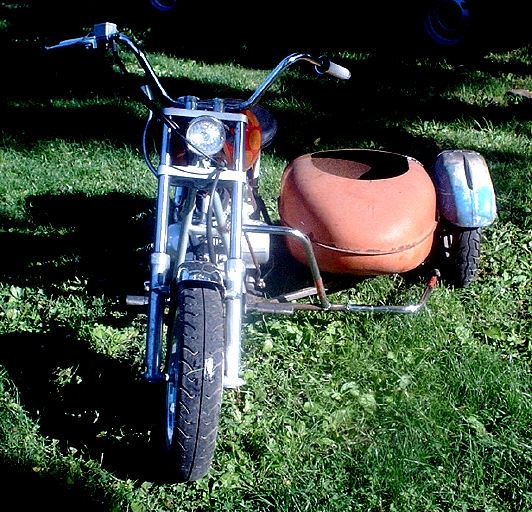 front view of the big mini it a 50cc with alot of parts added and then the sidecar it still a a bit to go.