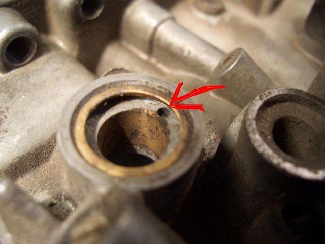 ...and this hole leading to the carb venturi.
Why?