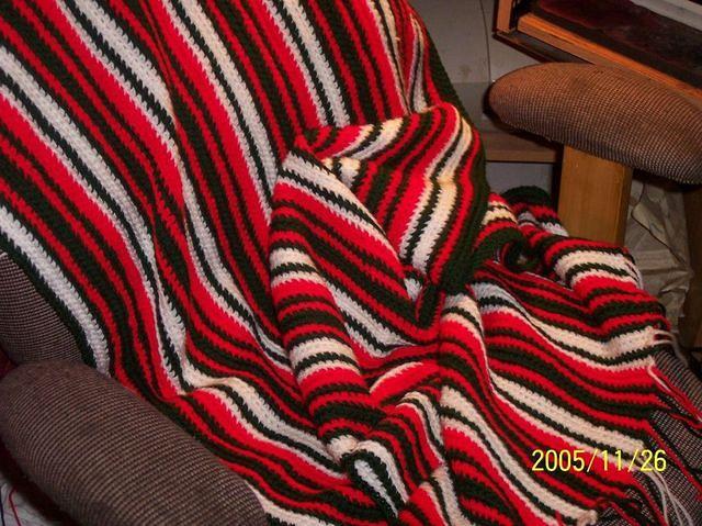 An afaghan that i crochetted, in Christmas colours, cause i had some yarn left over from another project.