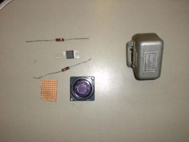 All the parts needed to make your own 7v regulator. (I was going to use the speaker  shown in the middle as my ground insulator 