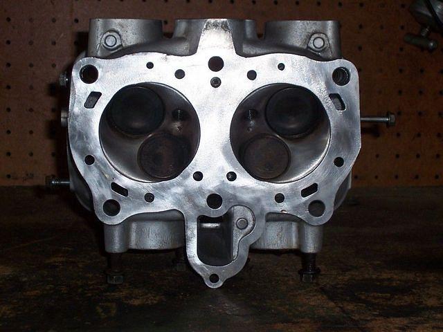Head all shiny, clean, and free of all head gasket remnants. Combustion chamber looks almost brand new.