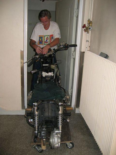 Had to take off the handlebar to get it through the door, Behind me where the doorblade ends we had to turn the bike 90 degress 