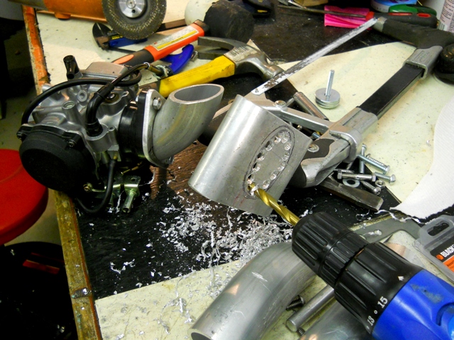 LIKE EVERYTHING ELSE ON THIS BIKE-BUILDING OUR OWN VERSION OF A BLOWER INTAKE