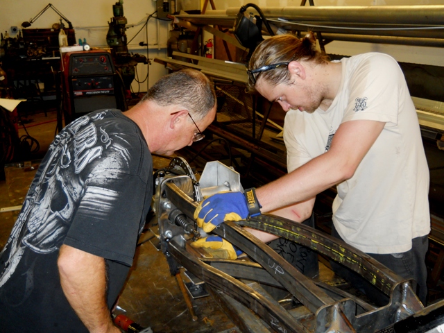 TWO OF THE BEST FABRICATORS I HAVE EVER HAD THE PLEASURE OF WORKING WITH WORKING IN SECOND GUSSET BACK LEGS OF SWINGARM