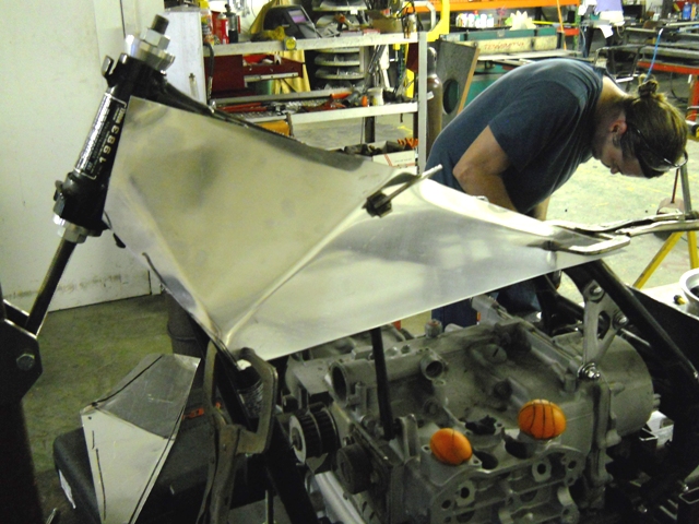 WHILE CHRIS DRILLS HUB PLATE- WINSTON IS TRYING HIS HAND AT BUILDING SIDE PANELS FOR THE FIRST TIME
