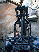 This is what the frame looks like after the hacksaw and new frame pieces in place. 