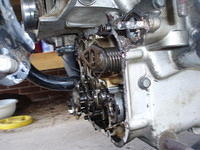 I had to cut the head off to remove the transmission cover