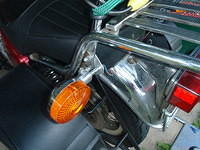 Turn signals are attached to plates bolted to attachment points for sissybar, removed stock grab bar
