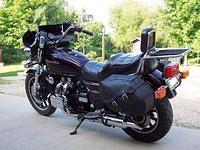 Here she is, my '83 GL1100 Std.  Custom paint, seat, sissybar/backrest. Blacked out engine.  Taillight is from a 650 Honda Custo