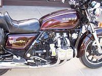 Here's a shot from the other side in the sun ...... help's bring out the color of the custom paint job (not by me) and dig that 