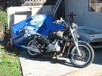 Lowered by the straps, no brakes, on ground safely