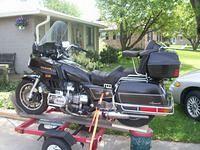 Transporting my 1200 Aspy the day I adopted it ... 

Poor Thang with all those clothes,  Hey ,,, Let's get naked ...