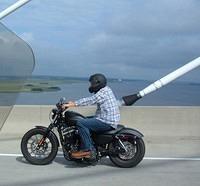 Craig, my youngest on his 09 IRON. Not a bad looking bike for a HD!!!LMAO