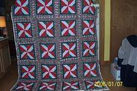 Christmas quilt made for another girl at work... believe it or not ..is the same pattern as the Hatchett ...just done in differe