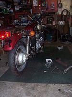 Another crappy shot of the rear end of the Goldwing makes my garage look like a tornado hit it. You can see the camshaft and the