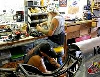 TWO VERY HELPFUL GUYS- HONDA JOE ON THE ENGINE HEADS - FRED WITH THE SHOP AND BIKE