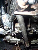 This pipe from needle nose you see there down to the forward bottom motor mount is very important ast greatly helps hold the con